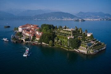 Fototapeta na wymiar Aerial view of Isola Bella drone panoramic view. Borromean Islands, Lake Maggiore, Piedmont, Europe. Panorama at sunset on Lake Maggiore top view. Lake Maggiore, island, Isola Bella, Italy.