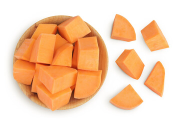 Sweet potato slices in a wooden bowl isolated on white background. Top view. Flat lay