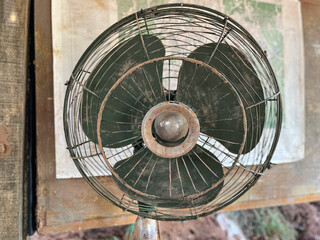 dirty old metalic green fan