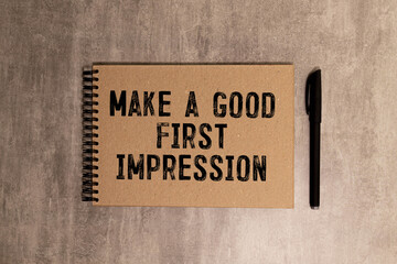 Businessman hold white card with text Make a good first impression Calculator, wood box, money and...