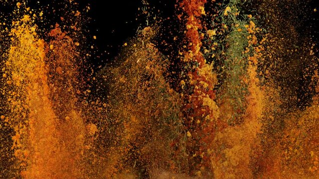 Super Slow Motion Shot of Colorful Explosion of Various Spices on Black Background at 1000fps.