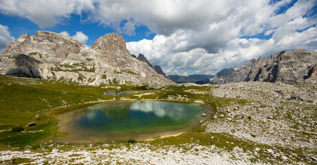 crystal-clear Laghi dei Piani at Dolomite Mountains in summer day.