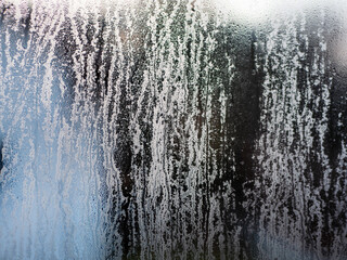Condensation: Water droplets forming on Window Glass