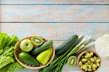 Green Fruits and Vegetables on Vintage Painted Boards, Copy Space