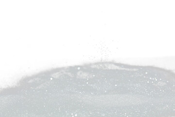 Explosion metallic silver glitter sparkle. Silver Glitter powder spark blink celebrate, blur foil explode in air, fly white glitters particle. Black background isolated, selective focus Blur bokeh