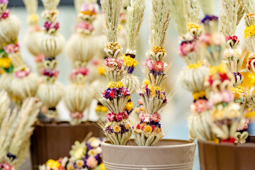 Traditional Lithuanian Easter palms known as verbos sold on Kaziukas, Easter market in Vilnius.