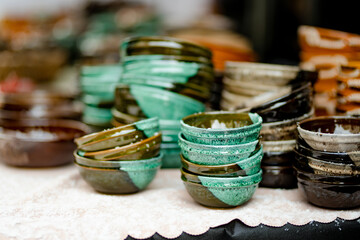 Ceramic dishes, tableware and jugs sold on Easter market in Vilnius. Lithuanian capital's annual traditional crafts fair is held on Old Town streets.