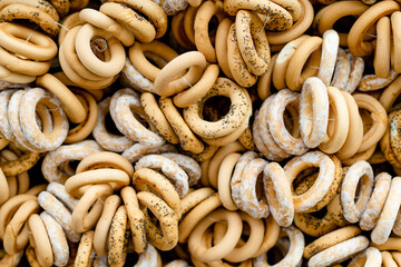 Loaves of organic bagels for sale at outdoor farmers market in Vilnius. Traditional spring fair in capital of Lithuania.