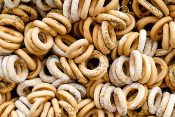 Loaves of organic bagels for sale at outdoor farmers market in Vilnius. Traditional spring fair in...