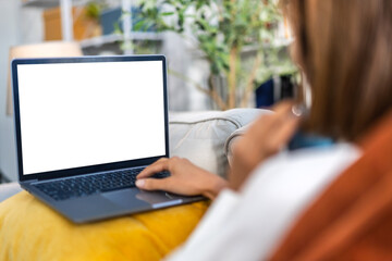 Human working with modern laptop computer blank white desktop screen for advertising, mockup,...