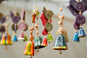 Colorful ceramic bells and other decorations sold on Easter market in Vilnius.