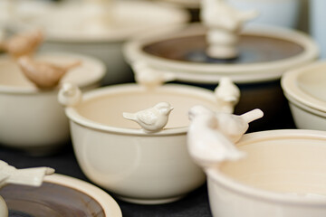 Ceramic dishes, tableware and jugs sold on Easter market in Vilnius. Lithuanian capital's annual traditional crafts fair is held on Old Town streets.
