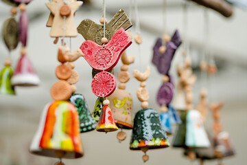 Colorful ceramic bells and other decorations sold on Easter market in Vilnius.