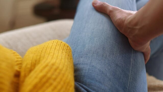 Sensual and seducing touches on woman's thigh