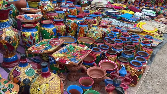 Varieties of colorful decorative beautiful clay vases being sold at a roadside stall in Kolkata, India