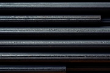 Fototapeta premium Close-up black metallic object, abstract wall pattern background