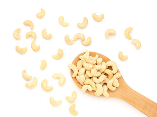 Spoon with tasty cashew nuts isolated on white background