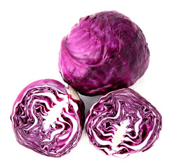 Whole and cut fresh red cabbages isolated on white, top view