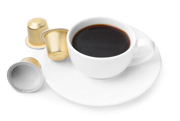 Obraz na płótnie Canvas Cup of coffee and capsules isolated on white