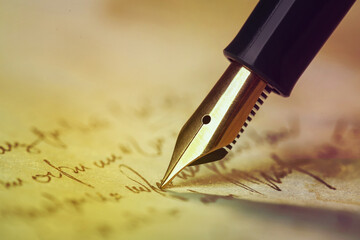 Writing letter with fountain pen, closeup. Space for text