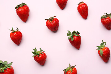 Fresh strawberries on lilac background