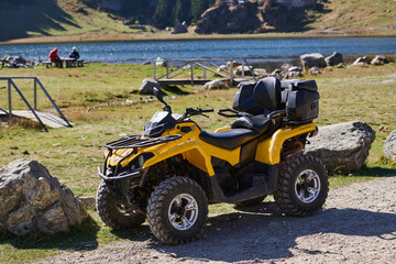 Yellow modern quad in nature ready for driving