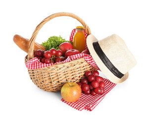Wicker basket with tasty food for picnic, juice and hat on white background
