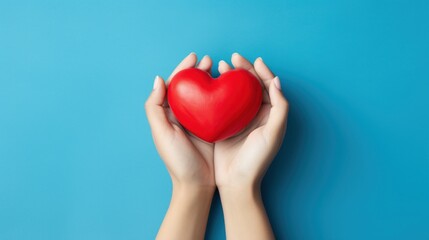 Fototapeta premium hands hold a red heart on a blue background AI generated