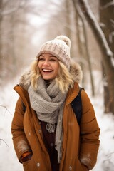 Image of happy blonde woman on walk in winter forest  AI generated