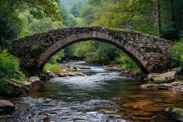 Fototapeta na wymiar Old stone bridge arching over a gentle river