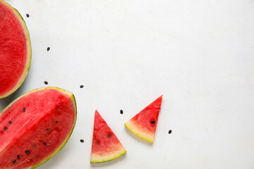 Composition with pieces of fresh ripe watermelon on white background