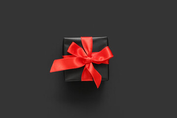 Gift box on dark background. Black Friday