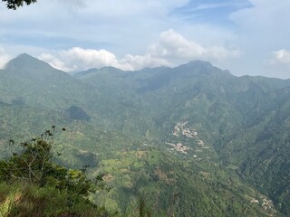 Fototapeta premium Beautiful countryside in the mountain. wonderful mountains. grassy field and rolling hills. 