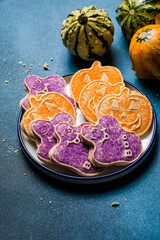 Halloween homemade gingerbread cookies background, close up