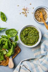 Pesto sauce and ingredients on white background, copy space.Food frame italian food background healthy food concept or ingredients for cooking pesto sauce on a vintage background top view with copy sp