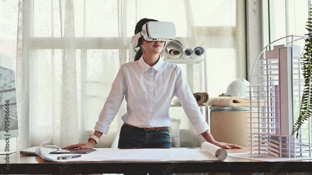 Fototapete architect young woman working with virtual reality technology modeling software applications in the 