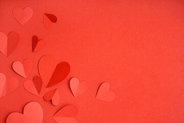 Beautiful paper hearts on red background. Valentine's Day celebration