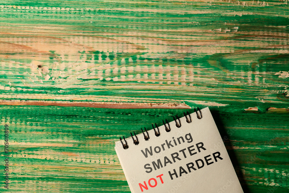 Poster notebook with working smarter not harder text