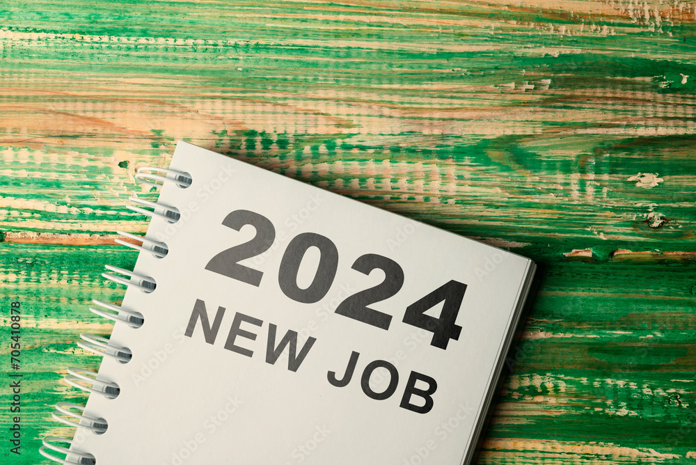 Poster notebook with 2024 new job text