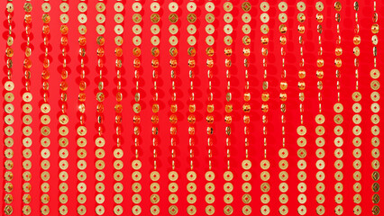 This abstract geometric red background, adorned with golden Chinese coins that can be manipulated, is a fitting backdrop for Chinese New Year festivities, jackpot salutations, or gatherings
