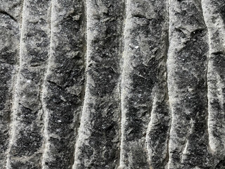 a rough stone wall texture with scratches