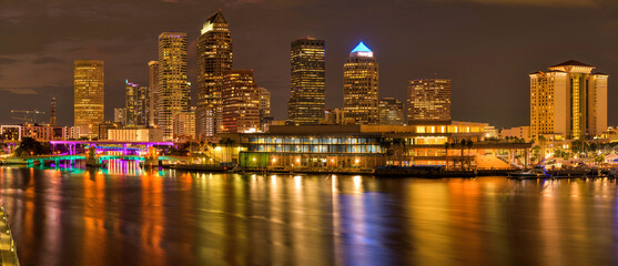 Tampa at Night - A closeup view of waterfront skyscrapers at Tampa Downtown on a calm Summer night....