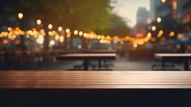 Empty wooden tables at a street cafe, inviting and warm with soft glowing lights in the background during a tranquil evening.