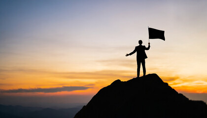 Silhouette businessman atop mountain holds blank flag, symbolizing success, leadership, and opportunity in bright sunlight