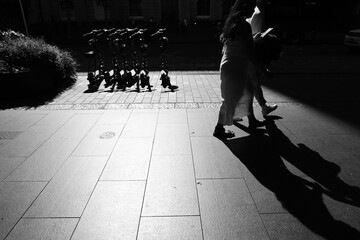 Black and white image of an inner city urban scene in summer
