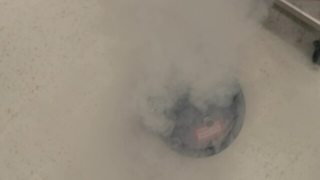 Formation of Vapor During the Transfer of Liquid Nitrogen from a Storage Tank to a Dewar - Close Up