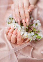 Elegant pastel pink natural manicure.