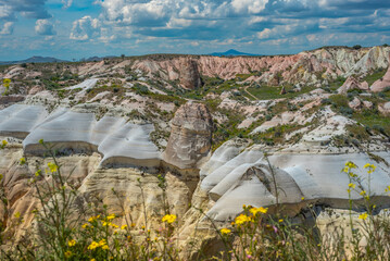 Martian landscape in Cappadocia, unique relief of mountains painted in yellow and pink colors