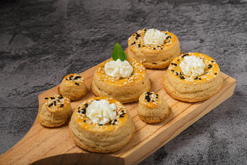 Puff pastry rolls with cream cheese. Desserts with cream cheese.