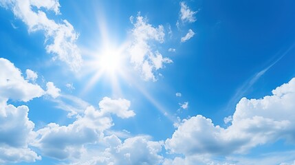 Naklejka na ściany i meble Sun with rays and glare clear blue sky and clouds Sunshine in a blue sky with white cumulus clouds in bright weather